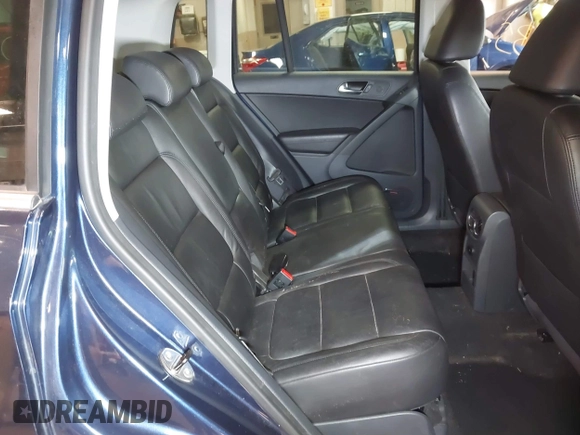 2011 Volkswagen Tiguan SE with VIN WVGBV7AXXBW533872, listed as a IAAI auction lot 40197835 with 104,685 mi miles and . Bid and sale history available at DreamBid. Image 8.