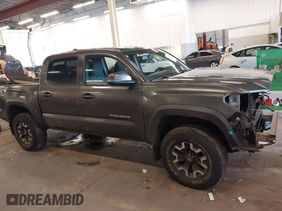 2016 Toyota Tacoma SR with VIN 3TMCZ5AN2GM041649, listed as a IAAI auction lot 41758859 with 139,558 mi miles and . Bid and sale history available at DreamBid. Image 14.