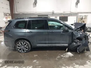 2022 Cadillac XT6 Sport with VIN 1GYKPGRS2NZ164879, listed as a IAAI auction lot 41555242 with 10,862 mi miles. Bid and sale history available at carsss.com. Image 13.