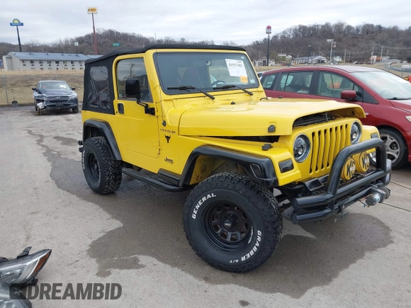 2000 Jeep Wrangler SE with VIN 1J4FA29P2YP797156, listed as a IAAI auction lot 41517183 with 114,236 mi miles. Bid and sale history available at carsss.com. Image 1.