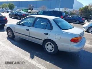2000 Chevrolet Prizm z VIN 1Y1SK548XYZ426149, wystawiony jako IAAI lot #41495791 z przebiegiem 127 968 mil mil oraz . Historia ofert i sprzedaży dostępna na DreamBid. Obrazek 3.