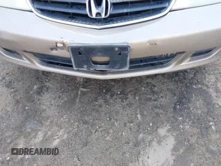 2003 Honda Odyssey EX-L z VIN 5FNRL18073B104192, wystawiony jako IAAI lot #42167068 z przebiegiem 346 764 mil mil oraz . Historia ofert i sprzedaży dostępna na DreamBid. Obrazek 6.