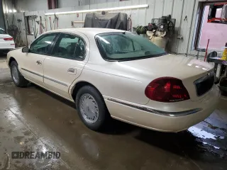 1998 Lincoln Continental with VIN 1LNFM97V9WY604317, listed as a Copart auction lot 83999234 with 91,277 mi miles and Salvage Title. Bid and sale history available at carsss.com. Image 2.