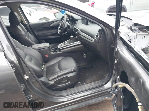 2018 Mazda CX-9 Touring with VIN JM3TCBCY3J0212479, listed as a IAAI auction lot 41737024 with 128,552 mi miles and . Bid and sale history available at DreamBid. Image 5.