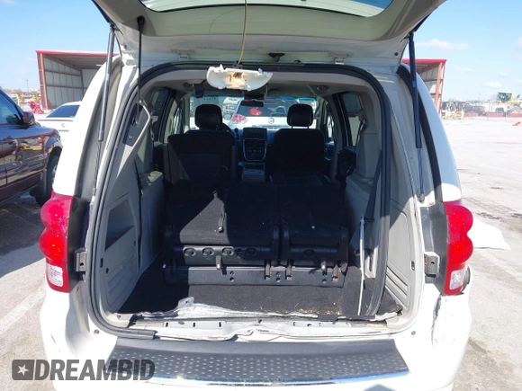 2013 Dodge Grand Caravan SXT with VIN 2C4RDGCG2DR522136, listed as a IAAI auction lot 42023561 with 176,635 mi miles and . Bid and sale history available at DreamBid. Image 18.