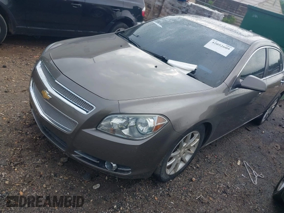 2012 Chevrolet Malibu LTZ with VIN 1G1ZG5E7XCF200982, listed as a IAAI auction lot 42052609 with 196,449 mi miles and . Bid and sale history available at DreamBid. Image 2.
