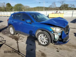 2013 Mazda CX-5 Grand Touring with VIN JM3KE4DE8D0166948, listed as a Copart auction lot 76067314 with 170,812 mi miles and Non Repairable. Bid and sale history available at carsss.com. Image 4.