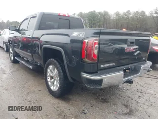 2017 GMC Sierra 1500 SLT z VIN 1GTV2NEC5HZ180843, wystawiony jako IAAI lot #41509410 z przebiegiem 89 943 mil mil oraz . Historia ofert i sprzedaży dostępna na DreamBid. Obrazek 3.