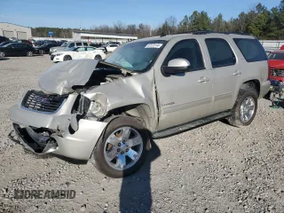 2013 GMC Yukon SLT with VIN 1GKS1CE02DR354723, listed as a Copart auction lot 87373144 with 160,332 mi miles and Salvage Title. Bid and sale history available at carsss.com. Image 1.