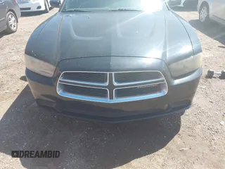 2013 Dodge Charger SE with VIN 2C3CDXBGXDH643384, listed as a IAAI auction lot 41977909 with 124,666 mi miles. Bid and sale history available at carsss.com. Image 6.