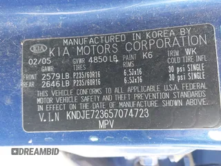 2005 Kia Sportage LX z VIN KNDJE723657074723, wystawiony jako IAAI lot #42372967 z przebiegiem 105 934 mil mil oraz . Historia ofert i sprzedaży dostępna na DreamBid. Obrazek 9.