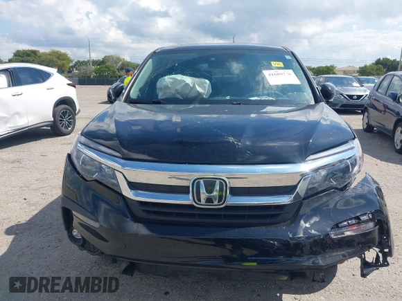 2020 Honda Pilot EX-L with VIN 5FNYF5H59LB014225, listed as a IAAI auction lot 41689776 with 90,994 mi miles. Bid and sale history available at carsss.com. Image 13.