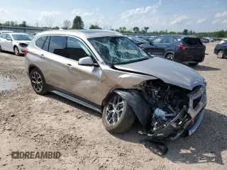 2021 BMW X1 xDrive28i with VIN WBXJG9C09M5S52289, listed as a Copart auction lot 64413105 with Not provided miles and Salvage title. Bid and sale history available at DreamBid. Image 4.
