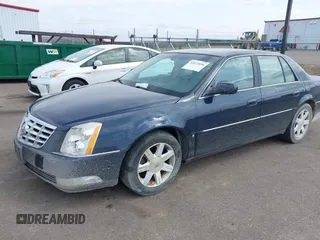 2006 Cadillac DTS w/1SC with VIN 1G6KD57Y26U103494, listed as a IAAI auction lot 42072696 with 85,675 mi miles. Bid and sale history available at carsss.com. Image 2.
