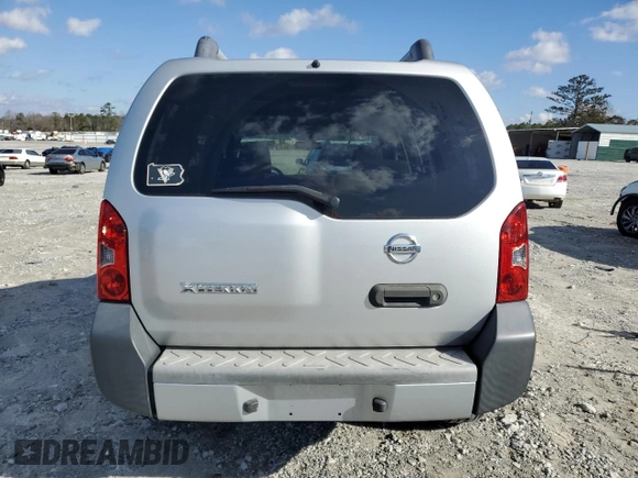 2010 Nissan Xterra S with VIN 5N1AN0NU2AC523002, listed as a Copart auction lot 87229904 with 93,356 mi miles and Salvage title. Bid and sale history available at DreamBid. Image 6.