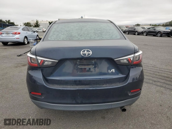 2016 Scion iA with VIN 3MYDLBZV0GY100913, listed as a Copart auction lot 72534744 with 93,965 mi miles and Salvage Title. Bid and sale history available at carsss.com. Image 6.
