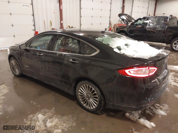 2014 Ford Fusion Titanium Hybrid with VIN 3FA6P0RUXER355654, listed as a IAAI auction lot 41611653 with 211,353 mi miles. Bid and sale history available at carsss.com. Image 3.