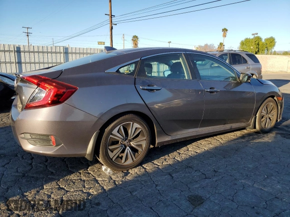 2017 Honda Civic Sedan EX-T with VIN 2HGFC1F49HH652688, listed as a Copart auction lot 87922535 with 108,071 mi miles and Salvage Title. Bid and sale history available at carsss.com. Image 3.
