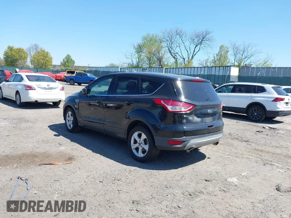 2015 Ford Escape SE with VIN 1FMCU9GX3FUC14020, listed as a IAAI auction lot 42069921 with 111,113 mi miles. Bid and sale history available at carsss.com. Image 3.