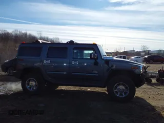 2005 Hummer H2 SUV with VIN 5GRGN23U15H117796, listed as a IAAI auction lot 41543913 with 195,560 mi miles. Bid and sale history available at carsss.com. Image 13.