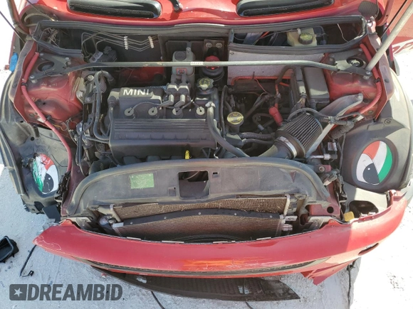 2004 MINI Hardtop z VIN WMWRC334X4TC51255, wystawiony jako Copart lot #55153845 z przebiegiem 161 362 mil mil oraz Szkoda całkowita • Salvage title. Historia ofert i sprzedaży dostępna na DreamBid. Obrazek 11.