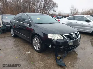2009 Volkswagen Passat Sedan Komfort with VIN WVWJK73C99P001231, listed as a IAAI auction lot 41711597 with 155,515 mi miles. Bid and sale history available at carsss.com. Image 1.