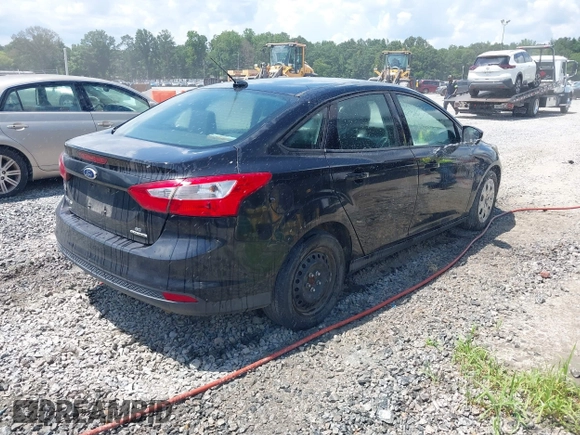 2012 Ford Focus SE with VIN 1FAHP3F21CL390012, listed as a IAAI auction lot 42634521 with 214,617 mi miles and . Bid and sale history available at DreamBid. Image 4.