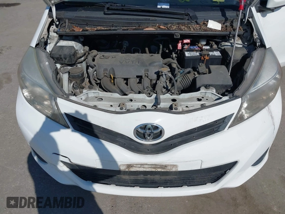 2014 Toyota Yaris L with VIN VNKJTUD35EA011933, listed as a IAAI auction lot 42150303 with 114,369 mi miles. Bid and sale history available at carsss.com. Image 10.