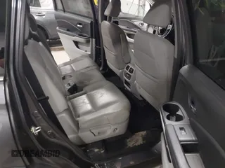 2017 Honda Pilot EX-L with VIN 5FNYF6H51HB080796, listed as a IAAI auction lot 40702843 with Not Provided miles and . Bid and sale history available at DreamBid. Image 8.