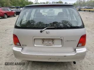 1996 Honda Odyssey with VIN JHMRA184XTC004544, listed as a Copart auction lot 53875355 with 165,945 mi miles and Salvage title. Bid and sale history available at DreamBid. Image 6.