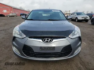 2012 Hyundai Veloster w/Black Int z VIN KMHTC6ADXCU025876, wystawiony jako Copart lot #50377835 z przebiegiem 185 181 mil mil oraz Czysty tytuł • Clean title. Historia ofert i sprzedaży dostępna na DreamBid. Obrazek 5.