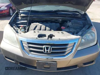 2010 Honda Odyssey EX-L with VIN 5FNRL3H79AB048049, listed as a IAAI auction lot 41440910 with 142,385 mi miles. Bid and sale history available at carsss.com. Image 10.