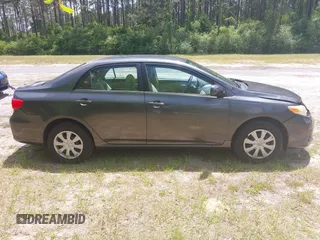 2011 Toyota Corolla L with VIN 2T1BU4EE0BC680158, listed as a IAAI auction lot 42060987 with 131,669 mi miles. Bid and sale history available at carsss.com. Image 13.