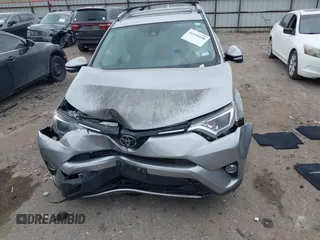 2018 Toyota RAV4 XLE with VIN JTMWFREV7JJ203609, listed as a IAAI auction lot 41938100 with 51,021 mi miles. Bid and sale history available at carsss.com. Image 12.