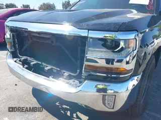 2016 Chevrolet Silverado 1500 LT with VIN 1GCRCREC0GZ246817, listed as a IAAI auction lot 41804303 with 39,198 mi miles and . Bid and sale history available at DreamBid. Image 6.