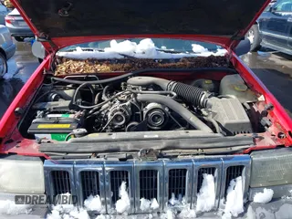 1996 Jeep Grand Cherokee Laredo with VIN 1J4GZ58Y8TC374929, listed as a IAAI auction lot 41725111 with 196,723 mi miles. Bid and sale history available at carsss.com. Image 10.