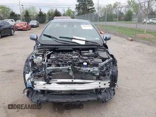 2020 Toyota Corolla SE with VIN 5YFS4RCE5LP056583, listed as a IAAI auction lot 42063358 with 58,027 mi miles and . Bid and sale history available at DreamBid. Image 12.