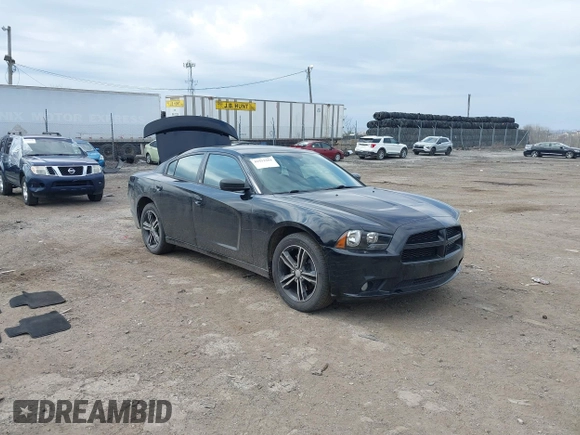 2014 Dodge Charger SXT Plus with VIN 2C3CDXJG2EH184239, listed as a IAAI auction lot 41912384 with 128,313 mi miles. Bid and sale history available at carsss.com. Image 1.