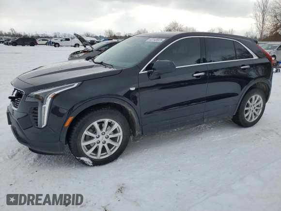 2022 Cadillac XT4 FWD Luxury z VIN 1GYAZAR48NF163967, wystawiony jako Copart lot #43148925 z przebiegiem 58 788 mil mil oraz Czysty tytuł • Clean title. Historia ofert i sprzedaży dostępna na DreamBid. Obrazek 1.