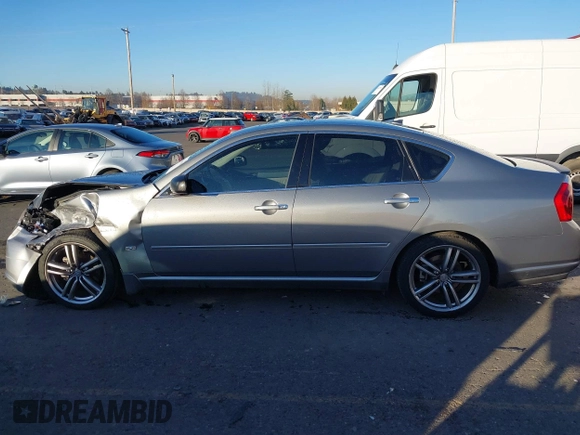 2006 Infiniti M z VIN JNKAY01E56M107083, wystawiony jako IAAI lot #41443347 z przebiegiem 162 191 mil mil oraz . Historia ofert i sprzedaży dostępna na DreamBid. Obrazek 14.