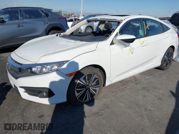 2017 Honda Civic EX-T with VIN 19XFC1E38HE002205, listed as a IAAI auction lot 40891678 with 10,398 mi miles and . Bid and sale history available at DreamBid. Image 17.