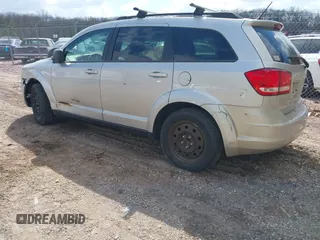 2014 Dodge Journey SE with VIN 3C4PDCAB2ET166065, listed as a IAAI auction lot 42137057 with 194,775 mi miles. Bid and sale history available at carsss.com. Image 3.