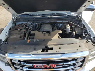 2017 GMC Sierra 1500 SLT z VIN 3GTU2NECXHG500119, wystawiony jako Copart lot #56707675 z przebiegiem 69 537 mil mil oraz Szkoda całkowita • Salvage title. Historia ofert i sprzedaży dostępna na DreamBid. Obrazek 11.