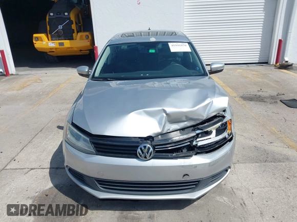 2012 Volkswagen Jetta Sedan SE w/Convenience with VIN 3VWDX7AJ1CM401939, listed as a IAAI auction lot 41941070 with 123,611 mi miles. Bid and sale history available at carsss.com. Image 12.