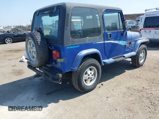 1995 Jeep Wrangler z VIN 1J4FY29S3SP213368, wystawiony jako IAAI lot #42425240 z przebiegiem 96 473 mil mil oraz . Historia ofert i sprzedaży dostępna na DreamBid. Obrazek 4.