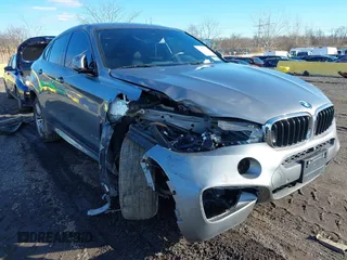 2019 BMW X6 xDrive35i with VIN 5UXKU2C54K0Z64117, listed as a IAAI auction lot 41078385 with 119,193 mi miles. Bid and sale history available at carsss.com. Image 1.