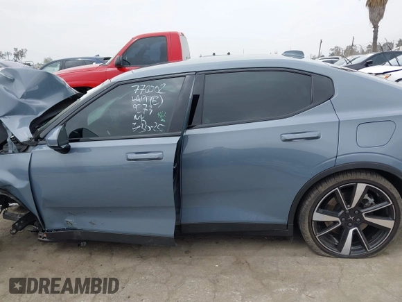 2022 Polestar 2 z VIN LPSED3KA1NL059476, wystawiony jako IAAI lot #42034791 z przebiegiem Nie podano mil oraz . Historia ofert i sprzedaży dostępna na DreamBid. Obrazek 13.