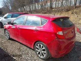 2015 Hyundai Accent Sport with VIN KMHCU5AE5FU200846, listed as a IAAI auction lot 41758805 with 84,987 mi miles. Bid and sale history available at carsss.com. Image 3.