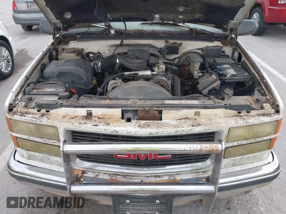 1997 GMC Yukon with VIN 1GKEK13R2VJ739795, listed as a IAAI auction lot 42011678 with 185,306 mi miles. Bid and sale history available at carsss.com. Image 10.