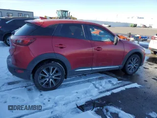2016 Mazda CX-3 Grand Touring with VIN JM1DKBD78G0113185, listed as a Copart auction lot 42802145 with 158,068 mi miles and Salvage Title. Bid and sale history available at DreamBid. Image 3.